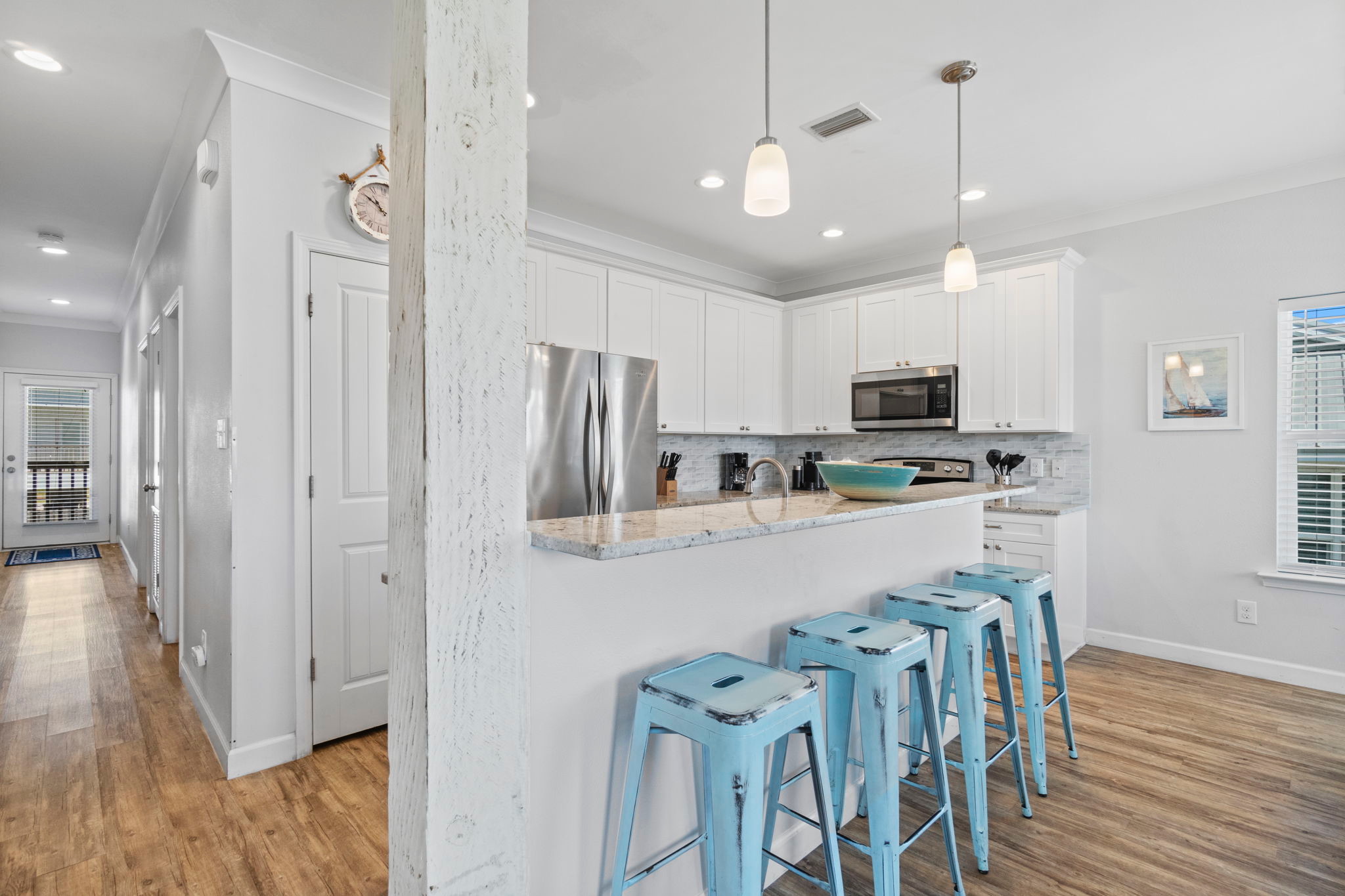 Kitchen bar with blue stools