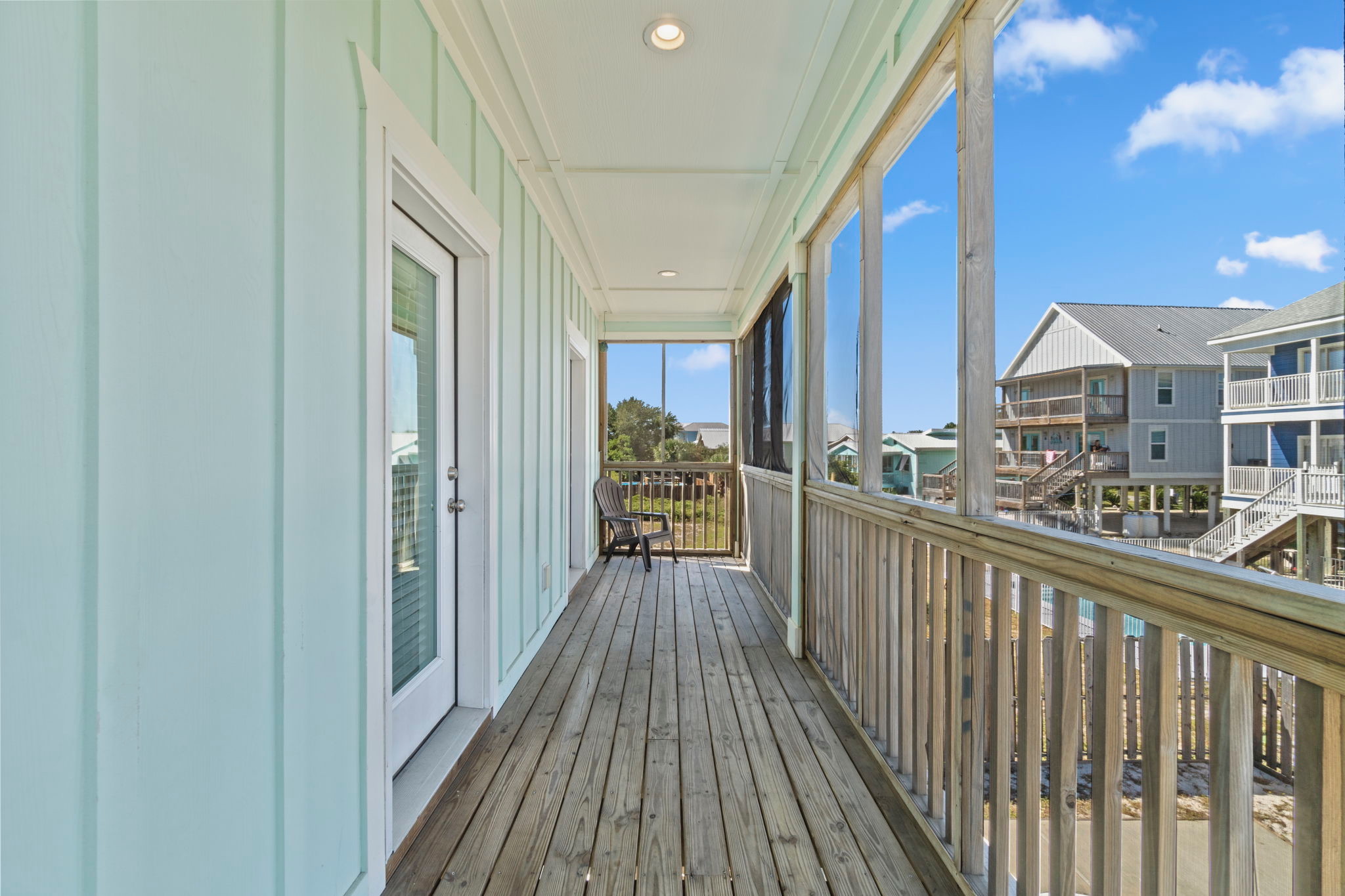 Front deck with Adirondack chairs